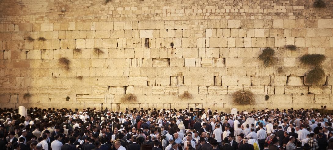 People praying at the Western Wall in Jerusalem 